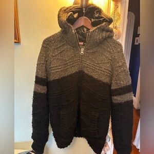 Scotch & Soda winter jacket lined with wool with a protective hood. Excellent